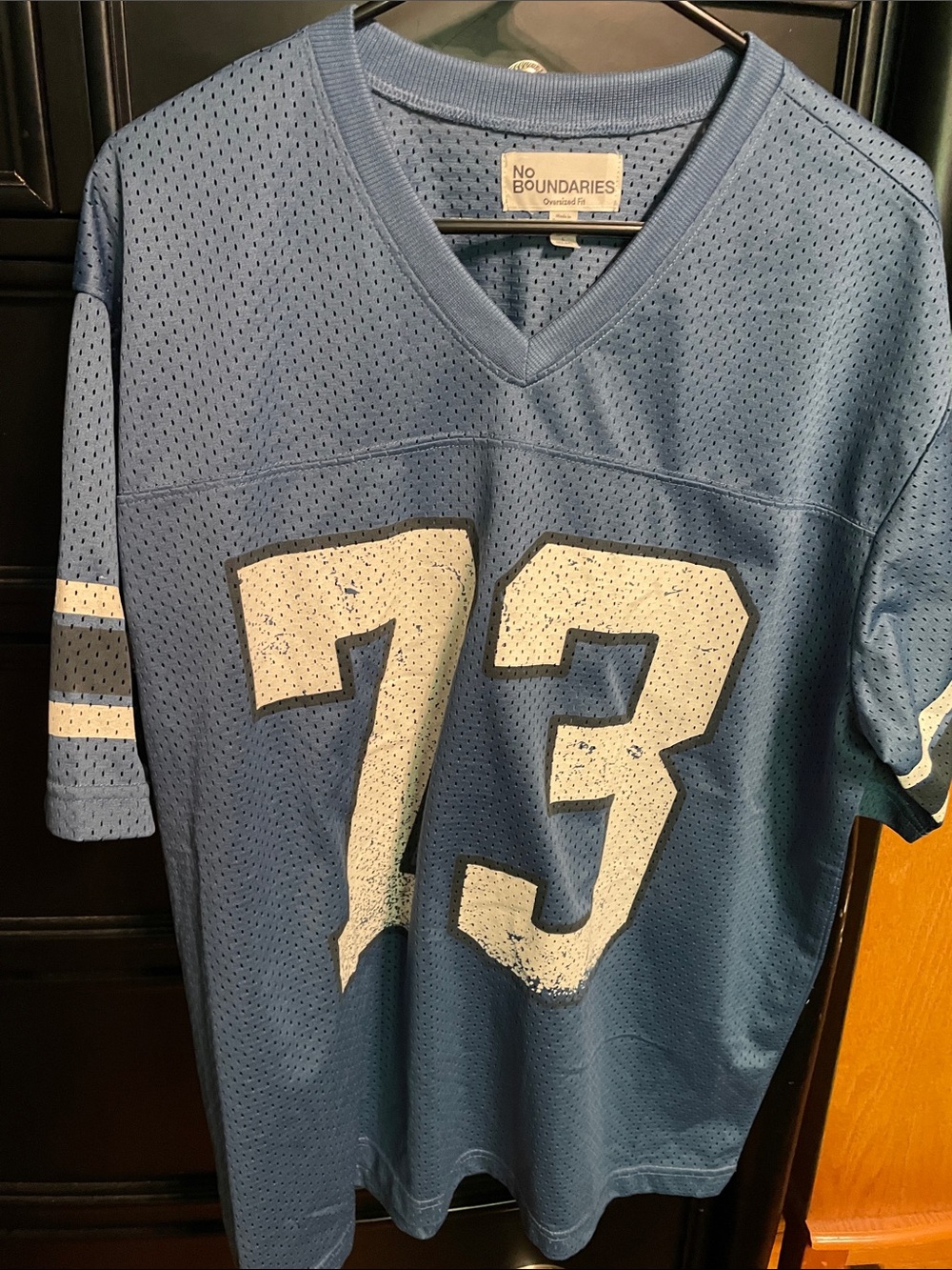 Light Blue Mesh Jersey Top with the number 73 in white